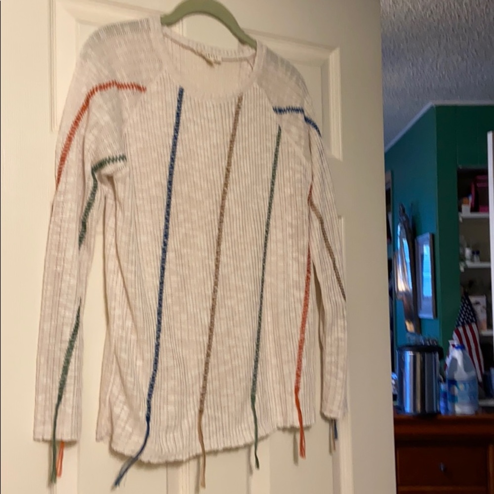 Promesa top beige with stripes.